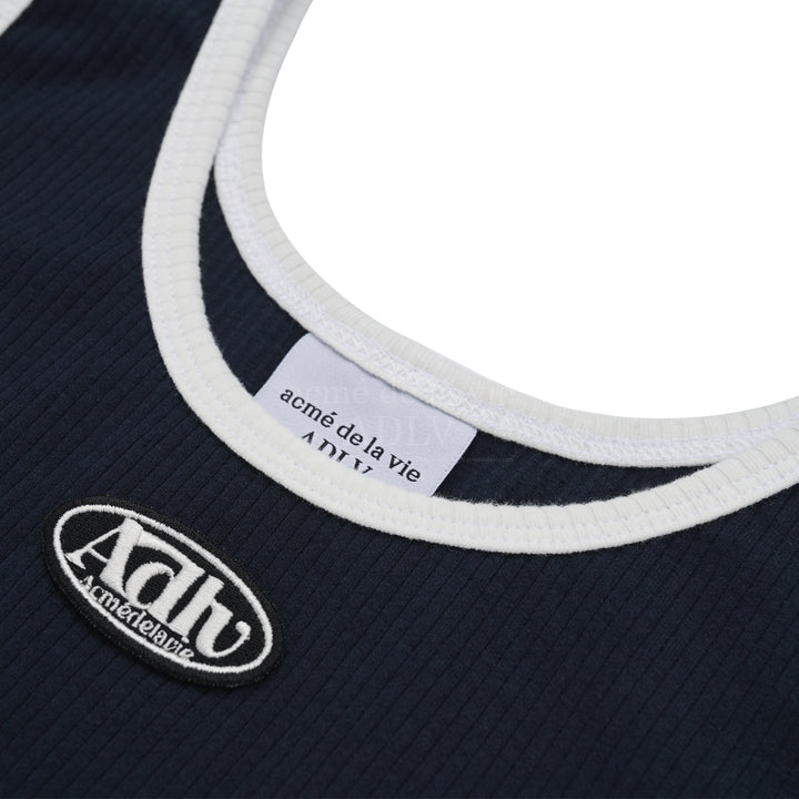 ADLV CIRCLE WAPPEN CROP TANK TOP NAVY