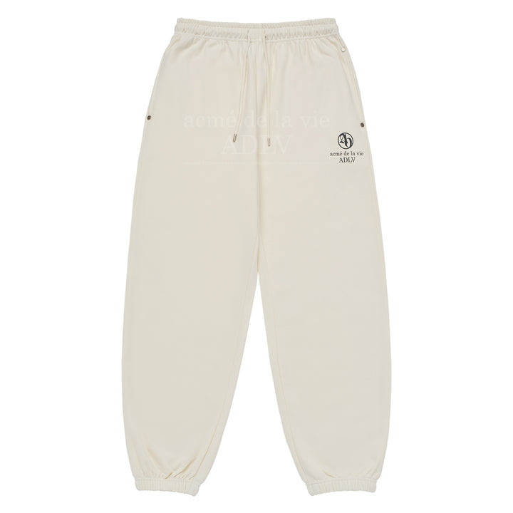 ADLV CIRCLE SYMBOL RIVET PANTS CREAM