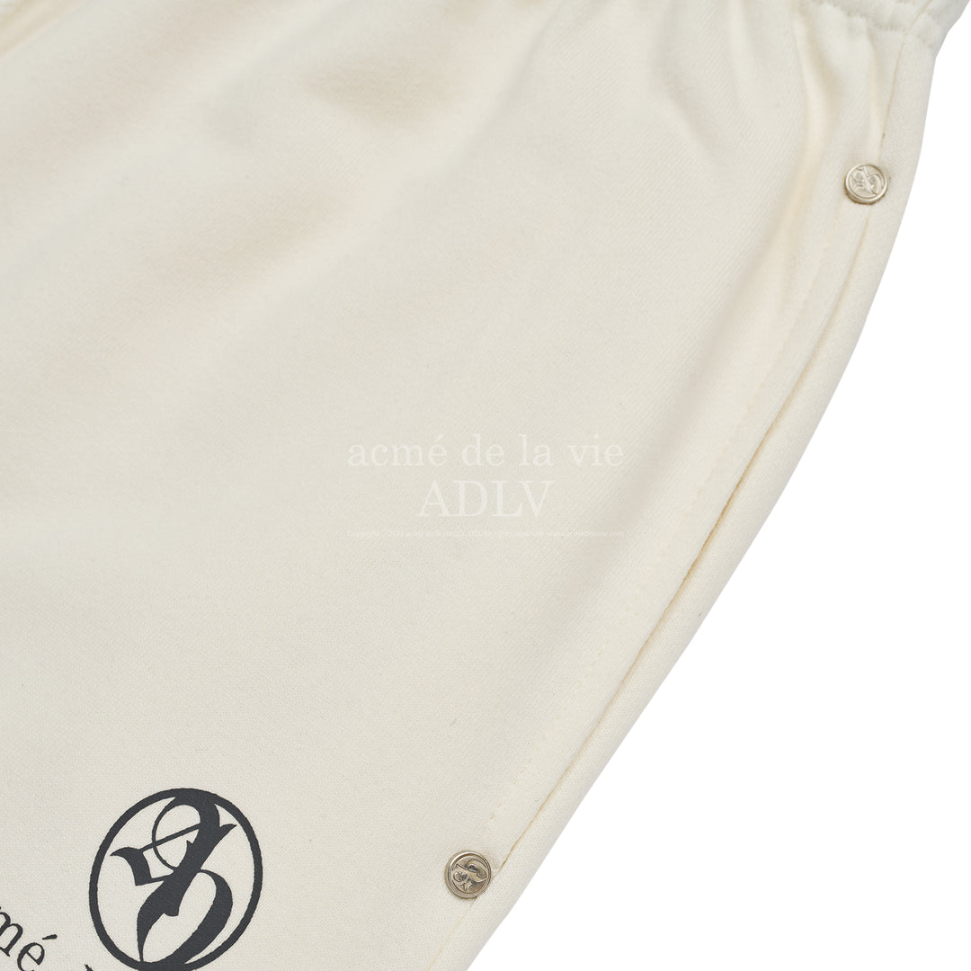 ADLV CIRCLE SYMBOL RIVET PANTS CREAM