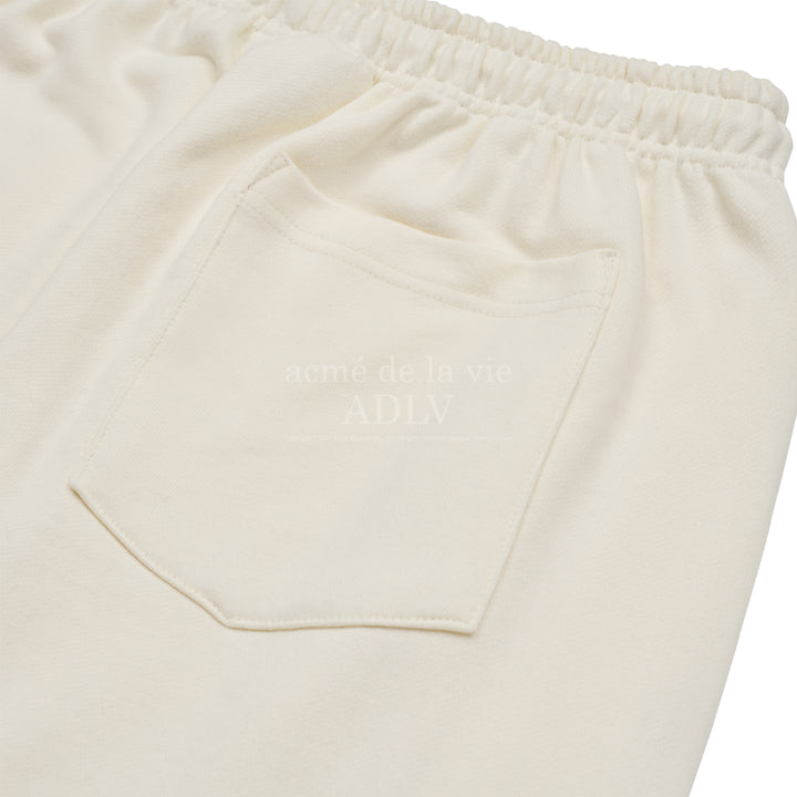 ADLV CIRCLE SYMBOL RIVET PANTS CREAM